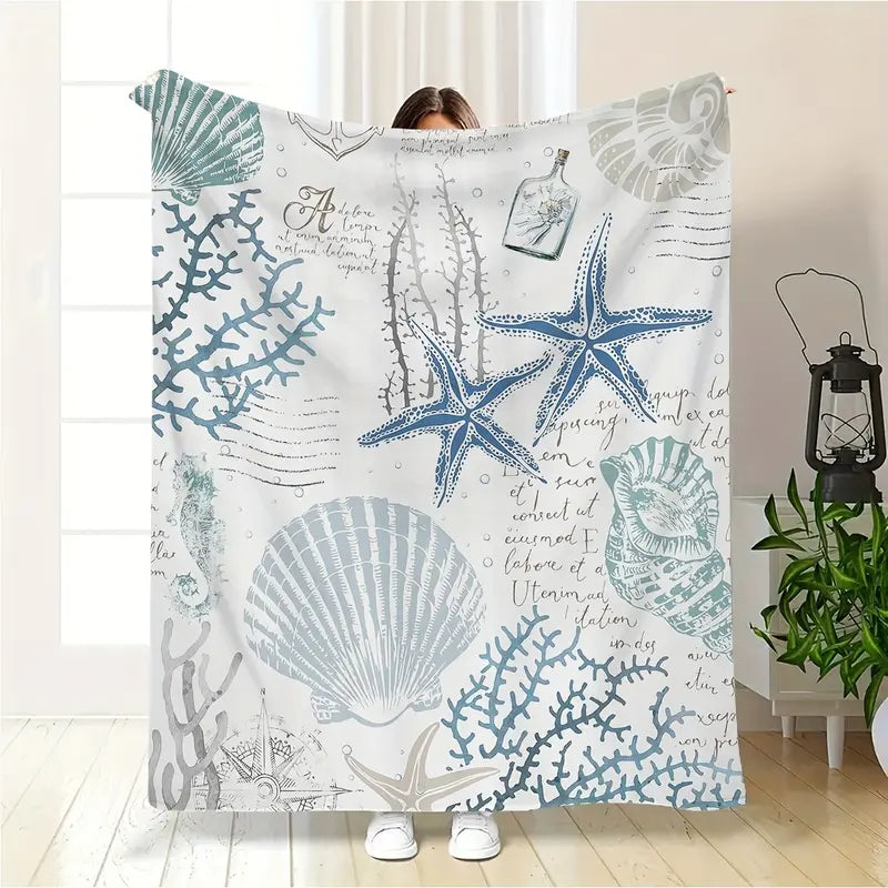 A modern ocean-themed blanket - machine washable flannel with coastal print featuring shells and corals - soft and comfortable multi-purpose blanket suitable for travel, camping, home decor - ideal gift for all seasons80