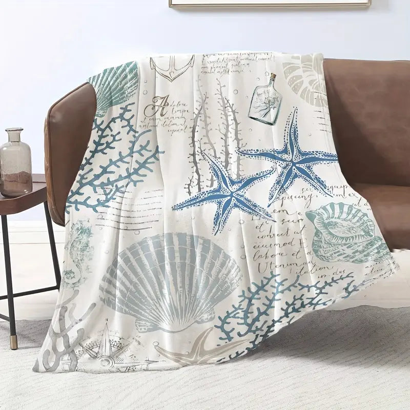 A modern ocean-themed blanket - machine washable flannel with coastal print featuring shells and corals - soft and comfortable multi-purpose blanket suitable for travel, camping, home decor - ideal gift for all seasons80